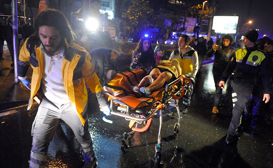 Medics and security personnel soon cordoned off the area and rescued the wounded after the attack that killed 39 people and injured 69 others. Some media reports state that the attacker, who is yet to be formally identified, had fought in Syria for Islamic State jihadists and used techniques he had learnt in the civil war. Turkish authorities have banned distribution of images relating to the Istanbul attack within Turkey. AP Medics and security personnel soon cordoned off the area and rescued the wounded after the attack that killed 39 people and injured 69 others. Some media reports state that the attacker, who is yet to be formally identified, had fought in Syria for Islamic State jihadists and used techniques he had learnt in the civil war. Turkish authorities have banned distribution of images relating to the Istanbul attack within Turkey. AP