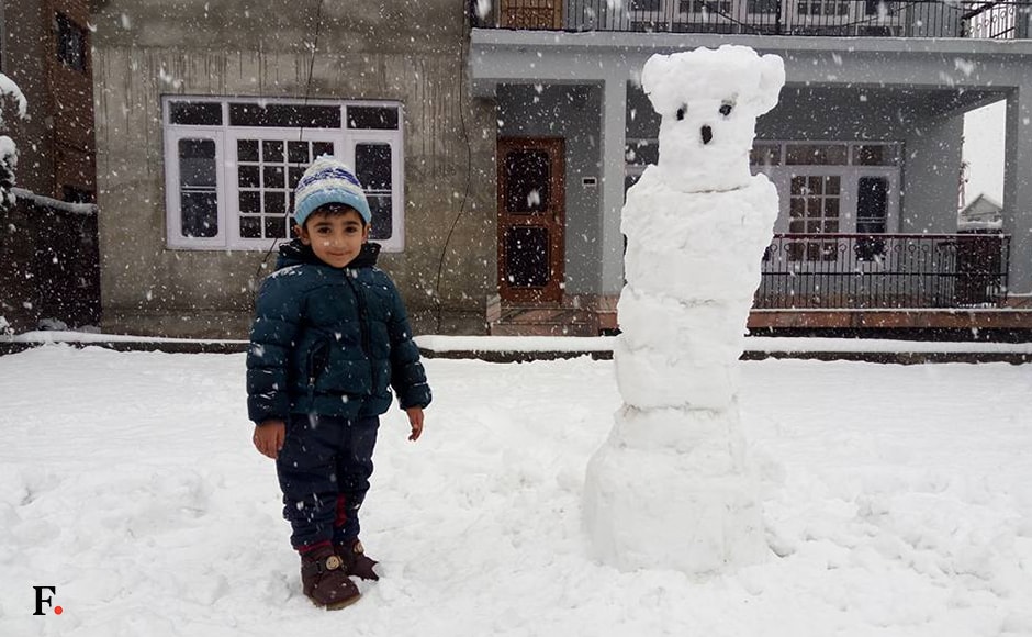 A Kashmiri boy with his snowmen outside his home in Srinagar, making snowmen is the favorite pastime of children during winters. The MET Office has forecast widespread snowfall or rains over the next two days also. Sameer Yasir/Firstpost A Kashmiri boy with his snowmen outside his home in Srinagar, making snowmen is the favorite pastime of children during winters. The MET Office has forecast widespread snowfall or rains over the next two days also. Sameer Yasir/Firstpost