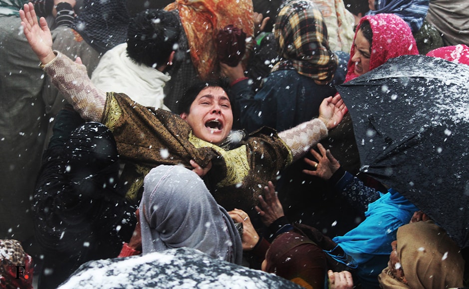 A woman wails as the dead body of a militant is being taken for the burial, massive clashes erupted in Sopore area with youths pelting stones and bricks on the forces. Image courtesy Eeshan Peer A woman wails as the dead body of a militant is being taken for the burial, massive clashes erupted in Sopore area with youths pelting stones and bricks on the forces. Image courtesy Eeshan Peer