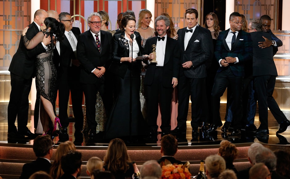 This image released by NBC shows Nina Jacobson, foreground center, with the cast and crew of This image released by NBC shows Nina Jacobson, foreground center, with the cast and crew of