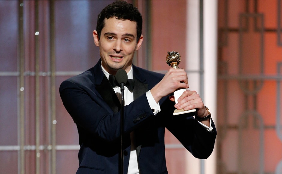 This image released by NBC shows Damien Chazelle with the award for best screenplay for This image released by NBC shows Damien Chazelle with the award for best screenplay for