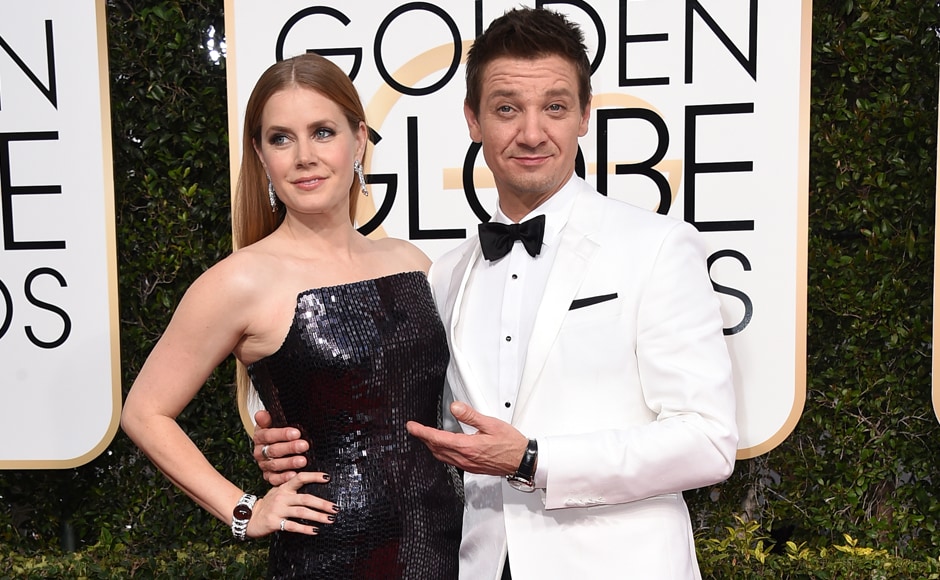 Amy Adams, left, and Jeremy Renner arrive at the 74th annual Golden Globe Awards at the Beverly Hilton Hotel on Sunday, Jan. 8, 2017, in Beverly Hills, Calif. (Photo by Jordan Strauss/Invision/AP) Amy Adams, left, and Jeremy Renner arrive at the 74th annual Golden Globe Awards at the Beverly Hilton Hotel on Sunday, Jan. 8, 2017, in Beverly Hills, Calif. (Photo by Jordan Strauss/Invision/AP)