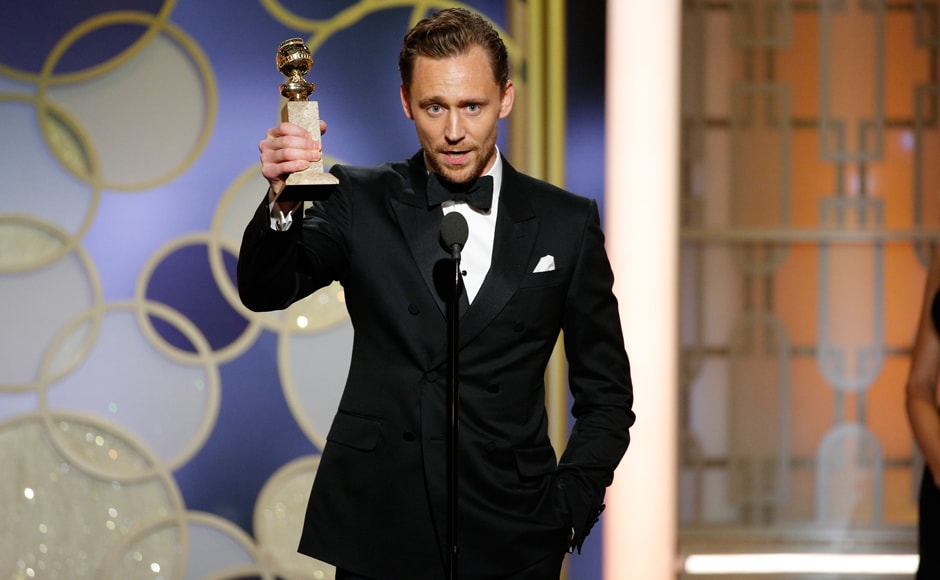 This image released by NBC shows Tom Hiddleston with the award for best actor in a limited series or TV movie for This image released by NBC shows Tom Hiddleston with the award for best actor in a limited series or TV movie for