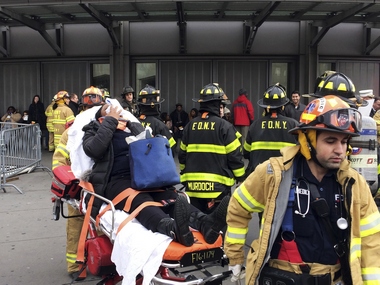 New York city commuter train derails in Brooklyn, more than 100 hurt New York city commuter train derails in Brooklyn, more than 100 hurt