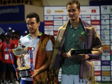 Roberto Buatista Agut holds the winning trophy after beating Daniil Medvedev in the Chennai Open final. AFP