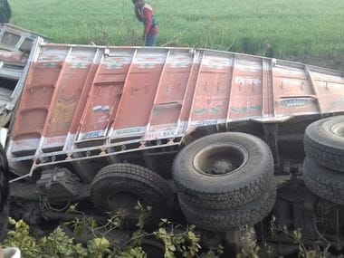 The truck seen overturned as it collided with a school bus killing over 20 children. Sameer Qureshi/ Firstpost