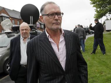 Former football star Paul Gascoigne faces assault trial for kissing incident after entering not guilty plea in court