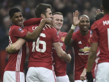 Wayne Rooney equalled Bobby Charlton's record as Manchester United cruised into the FA Cup 4th round. AFP