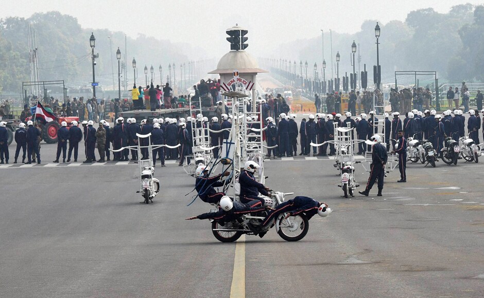 Army daredevils display their skills on motorcycles during a rehearsal for the Republic Day parade at Vijay Chowk in New Delhi on Tuesday. PTI Army daredevils display their skills on motorcycles during a rehearsal for the Republic Day parade at Vijay Chowk in New Delhi on Tuesday. PTI