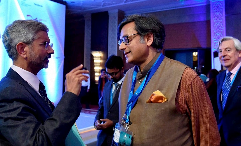 Foreign Secretary S Jaishanker interacting with former external affairs minister Shashi Tharoor at the second edition of the Raisina Dialogue. PTI