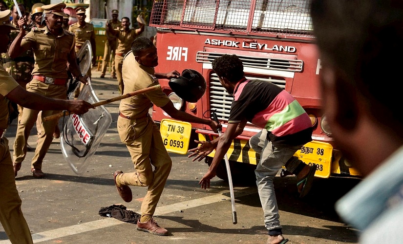 Pro-Jallikattu protesters during a violent clash with the police near Marina Beach in Chennai on Monday. PTI