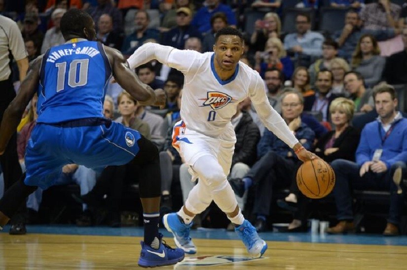 Jan 26, 2017; Oklahoma City, OK, USA; Oklahoma City Thunder guard Russell Westbrook (0) drives to the basket against Dallas Mavericks forward Dorian Finney-Smith (10) during the fourth quarter at Chesapeake Energy Arena. Mandatory Credit: Mark D. Smith-USA TODAY Sports