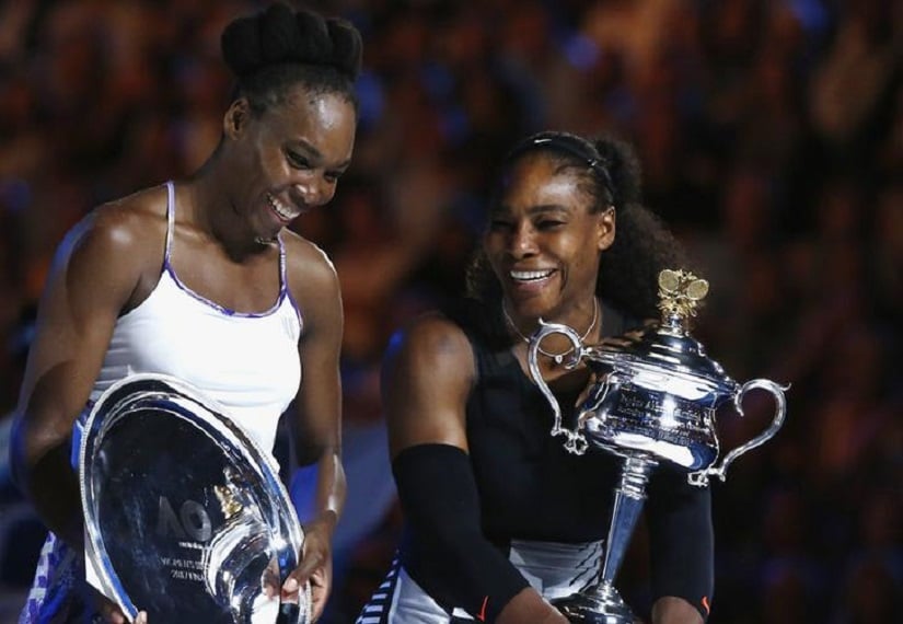 Tennis - Australian Open - Melbourne Park, Melbourne, Australia - 28/1/17 Serena Williams of the U.S. reacts as she holds her trophy after winning her Women's singles final match against Venus Williams of the U.S. .REUTERS/Thomas Peter