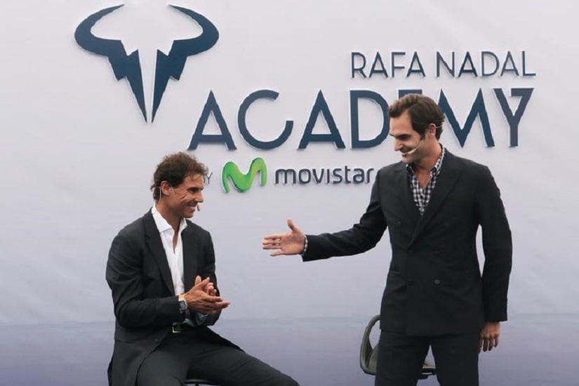 Switzerland's Roger Federer reaches out his hand to Spain's Rafael Nadal during the opening ceremony of the Rafa Nadal tennis academy in Manacor, Spain, October 19, 2016. REUTERS/Enrique Calvo
