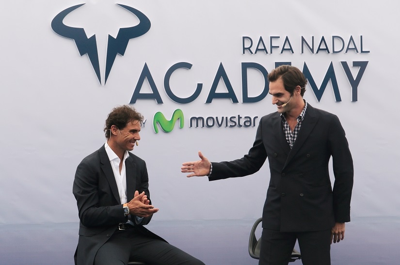 Roger Federer reaches out his hand to Spain's Rafael Nadal during the opening ceremony of the Rafa Nadal tennis academy in Manacor, Spain. Reuters