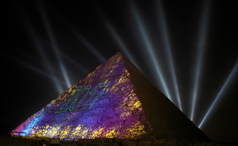 Lights reading 2017 are projected on the pyramids during New Year's day celebrations on the outskirts of Cairo, Egypt. Reuters Lights reading 2017 are projected on the pyramids during New Year's day celebrations on the outskirts of Cairo, Egypt. Reuters