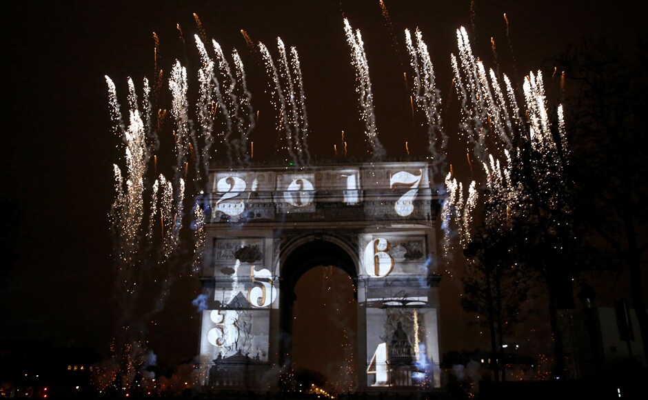 View of a light show on the city's iconic Arc de Triomphe monument during the New Year celebration in Paris, France. Reuters View of a light show on the city's iconic Arc de Triomphe monument during the New Year celebration in Paris, France. Reuters