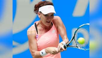 Agnieszka Radwanska survives 1st-round battle in Shenzhen; rain ruins day one of Auckland Classic