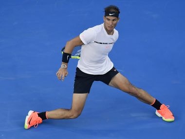 Rafael Nadal watches his return shot to Roger Federer during the Australian Open men's singles final. AP
