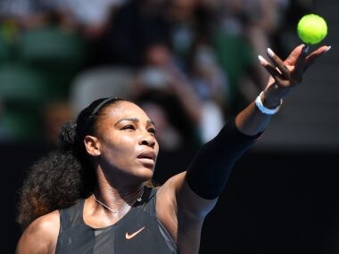 Serena Williams serves during the Australian Open. AFP