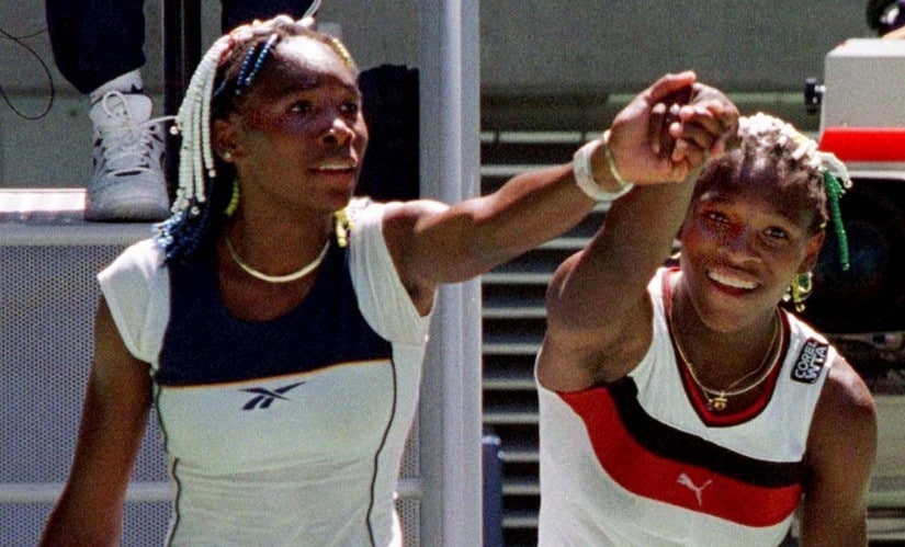 Venus Williams, left, and her sister Serena at the Australian Open in 1998, their first career clash against each other. Reuters