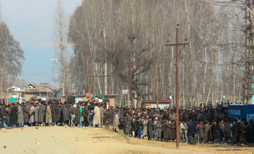 Residents try to march towards the site of a gun battle between security forces and militants in North Kashmir’s Hajin Town. Firstpost/Suhail Bhat