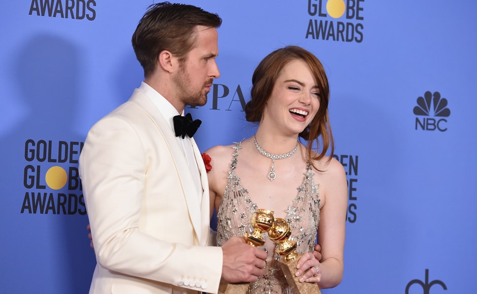 Ryan Gosling, left, and Emma Stone pose in the press room with the award for best performance by an actor and actress in a motion picture - musical or comedy for Ryan Gosling, left, and Emma Stone pose in the press room with the award for best performance by an actor and actress in a motion picture - musical or comedy for
