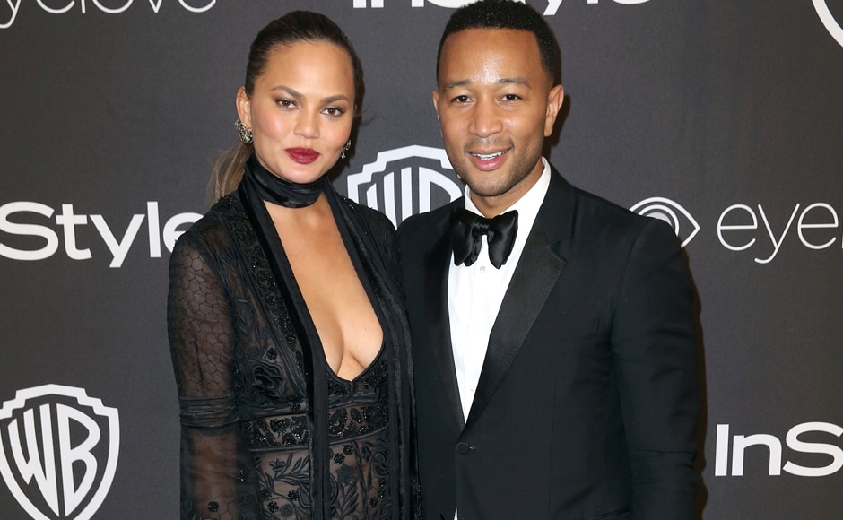 Chrissy Teigen, left, and John Legend arrive at the InStyle and Warner Bros. Golden Globes afterparty at the Beverly Hilton Hotel on Sunday, Jan. 8, 2017, in Beverly Hills, Calif. (Photo by Matt Sayles/Invision/AP) Chrissy Teigen, left, and John Legend arrive at the InStyle and Warner Bros. Golden Globes afterparty at the Beverly Hilton Hotel on Sunday, Jan. 8, 2017, in Beverly Hills, Calif. (Photo by Matt Sayles/Invision/AP)