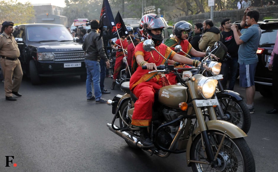 The young women arrive in style on bullets and decked up in traditional red attire. Sachin Gokhale/Firstpost The young women arrive in style on bullets and decked up in traditional red attire. Sachin Gokhale/Firstpost