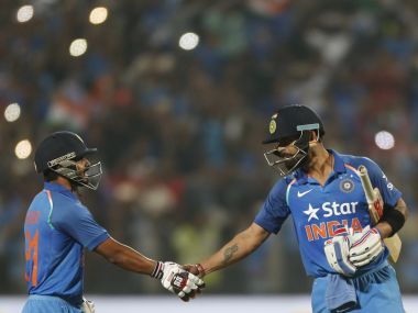 Virat Kohli and Kedar Jadhav during India's win in the Pune ODI. AP
