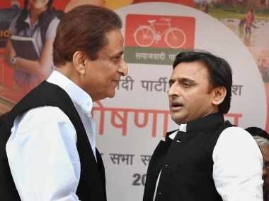 Uttar Pradesh Chief Minister and newly appointed party president Akhilesh Yadav with party leader Azam Khan in Lucknow on Sunday. PTI