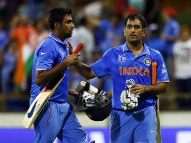 File photo of Ashwin (L) and Dhoni. Reuters
