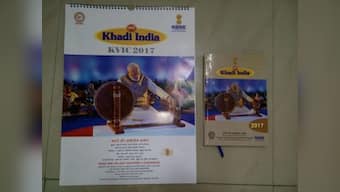 Narendra Modi replaces Gandhi in charkha photo: What is the BJP govt trying to prove?
