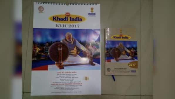 Narendra Modi replaces Gandhi in charkha photo: What is the BJP govt trying to prove?