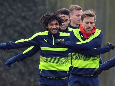 Arsenal players take part in a training session ahead of their Champions League clash against Bayern. AFP