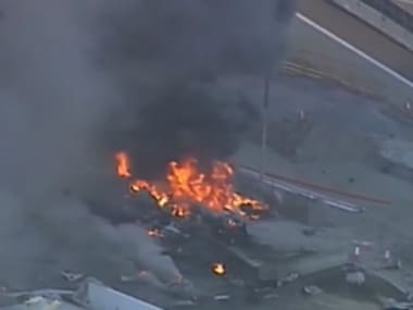 Footage of the wreckage burning. Image Courtesy: Youtube