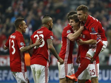 Bayern Munich's Thomas Mueller celebrates scoring with his teammates. AFP