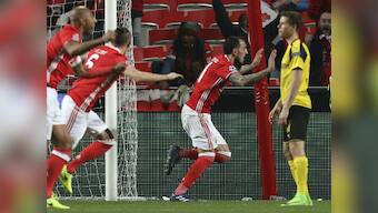 Champions League: Benfica edge past wasteful Borussia Dortmund in first leg of last 16