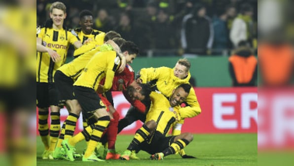 German Cup: Borussia Dortmund enter quarterfinals after shootout win over Hertha Berlin; Schalke through