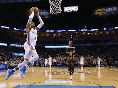 Oklahoma City Thunder guard Russell Westbrook goes up for an unopposed dunk against the Cleveland Cavaliers. AP
