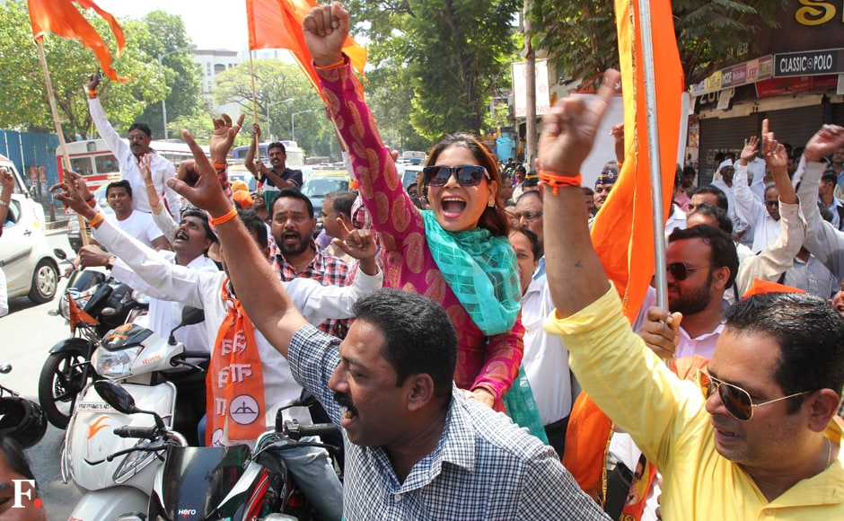 Sena workers ride through the city, celebrating their win. Sachin Gokhale/Firstpost Sena workers ride through the city, celebrating their win. Sachin Gokhale/Firstpost