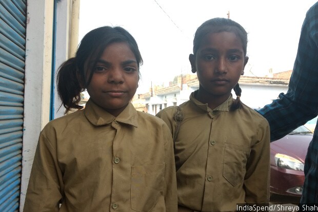 Eight-year-old Saidun Ahmed (left) on her way to school in Fattepur village, Mirzapur district in eastern Uttar Pradesh, said she couldn’t read well. Poor quality education and high absenteeism plague government schools in the state. Indiaspend/Shreya Shah