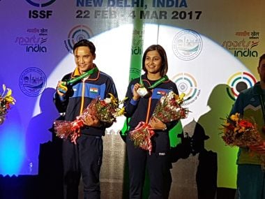Jitu Rai and Heena Sindhu with their medasl. Image courtesy: Twitter/@CoachRonak