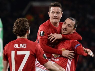 Manchester United's Zlatan Ibrahimovic (r) celebrates scoring his team's first goal. AFP