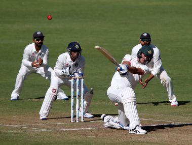 Australia's Mitchell Starc plays a shot on Day 1 of the Pune Test against India. Reuters
