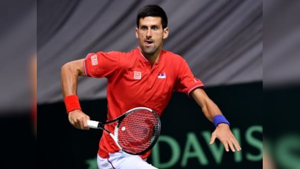 Davis Cup: Novak Djokovic survives scare to help Serbia lead 2-0, champions Argentina slump