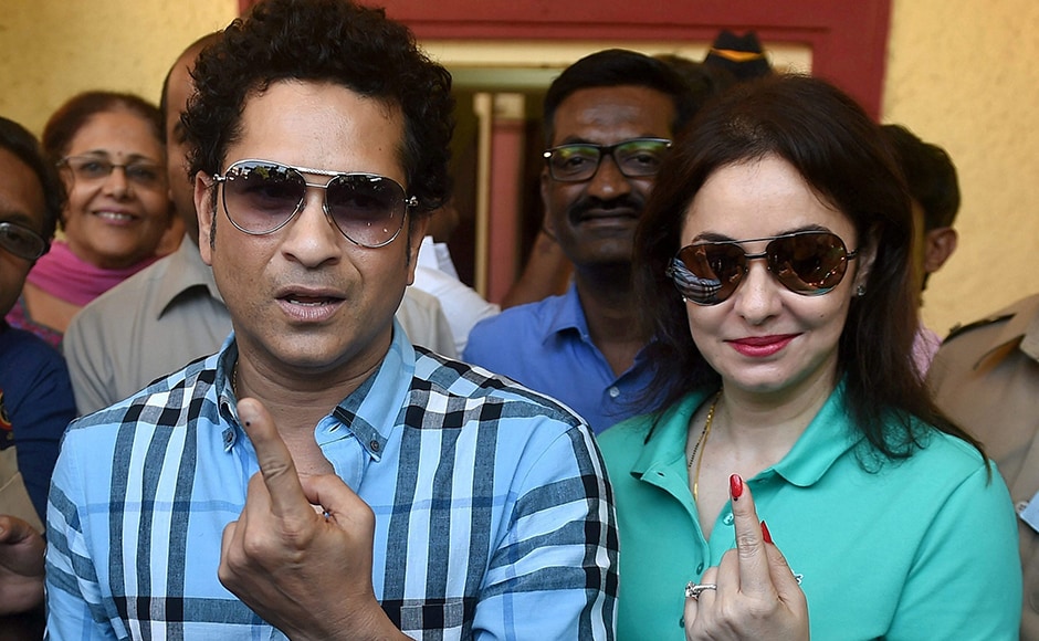 Cricket legend Sachin Tendulkar along with wife Anjali Tendulkar display the indelible ink mark on their fingers after casting the vote for the municipal corporation election in Mumbai on Tuesday. PTI Cricket legend Sachin Tendulkar along with wife Anjali Tendulkar display the indelible ink mark on their fingers after casting the vote for the municipal corporation election in Mumbai on Tuesday. PTI
