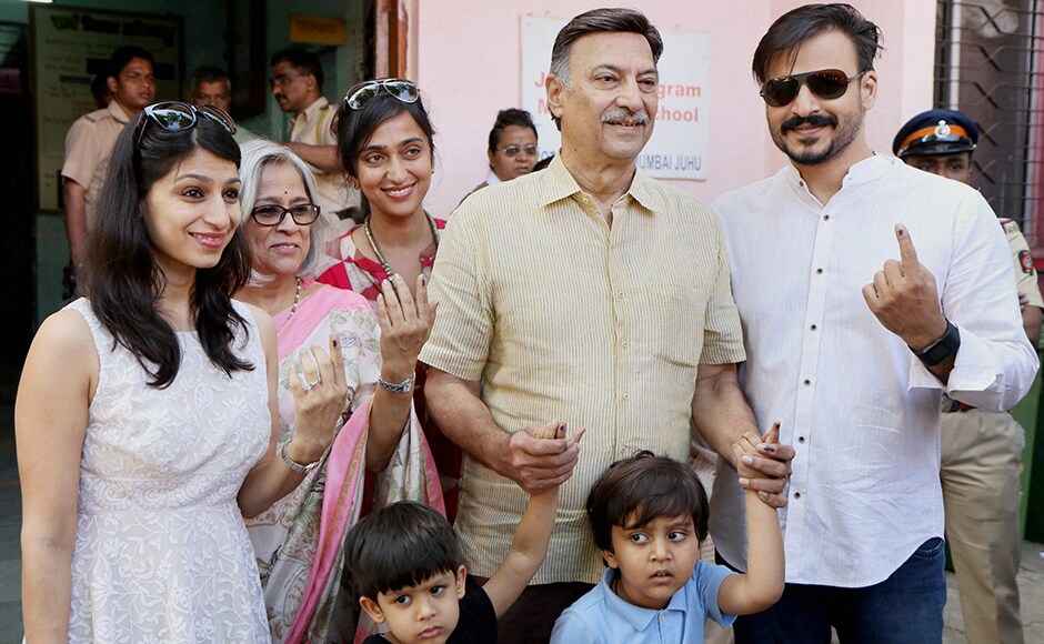 Bollywood actor Vivek Oberoi, along with his father Suresh Oberoi, mother, sister, wife and sons after casting their votes at Juhu in Mumbai on Tuesday. PTI Bollywood actor Vivek Oberoi, along with his father Suresh Oberoi, mother, sister, wife and sons after casting their votes at Juhu in Mumbai on Tuesday. PTI