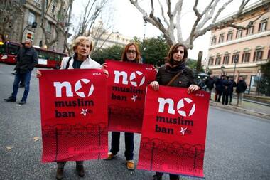 Donald Trump suspends travel ban after judge stays order but vows to 'overturn' court ruling