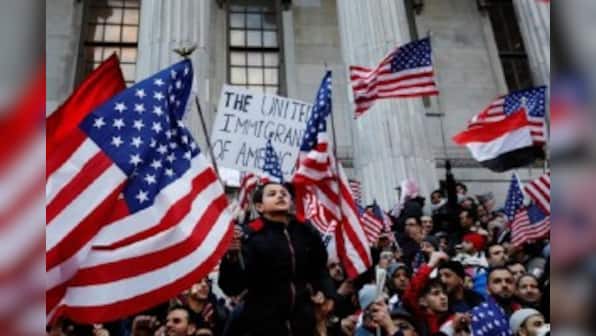 US immigration ban lifted: Travellers welcomed in New York with hugs and tears